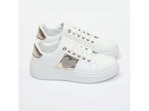 Sneakers in simil pelle con ricamo laterale