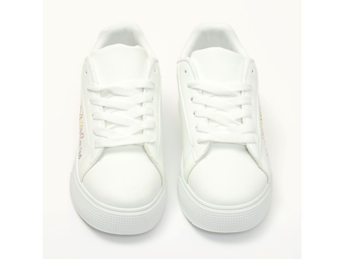 Sneakers in simil pelle con ricamo laterale