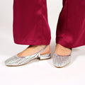 Ballerine slingback in simil pelle con tomaia bucherellata